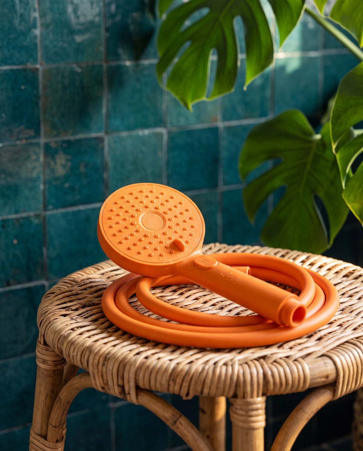Douchette Showrz mandarine, avec son flexible assorti